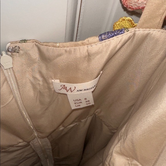 Stunning AW Bridal 3D floral dress new without tags.
Retails at $149 - Picture 8 of 11